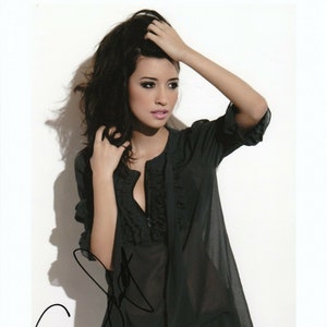 Christian Serratos Authentic Original Hand Signed Autographed 8x10 photo with a Certificate of Authenticity CoA Card and Numbered Hologram