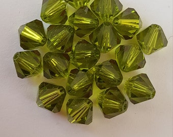 Toupies en cristal de Swarovski 6mm Vert - Olivine