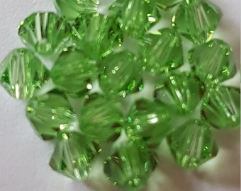 Toupies en cristal de Swarovski 4mm Vert - Chrysolite
