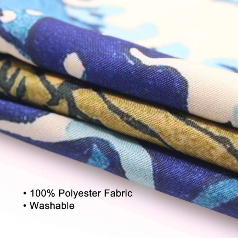 May include: Close-up of folded fabric with a blue, white, and yellow floral pattern. The fabric is 100% polyester and washable. The design features abstract shapes and a watercolor effect, creating a soft, flowing aesthetic.