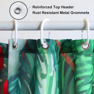 May include: A green and red tropical leaf patterned shower curtain with reinforced top header and rust resistant metal grommets.