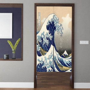 May include: A pair of wooden sliding doors with a printed image of a large blue wave crashing against a mountain. The wave is depicted in a traditional Japanese style with white foam and a dark blue background. The doors are framed in dark wood and have a simple design.