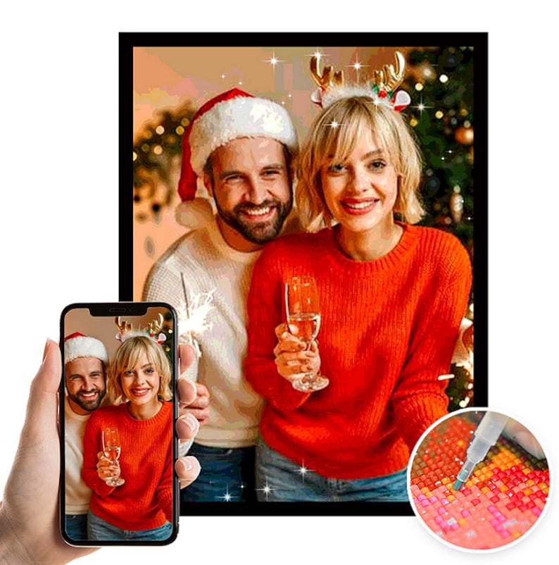 May include: A couple in festive attire, wearing Santa hats and reindeer antlers, pose for a Christmas photo. They are holding glasses of champagne and smiling. The image is a diamond painting kit, with a close-up of the diamond-encrusted canvas and a tool for applying the diamonds.