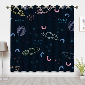 May include: Black curtains with a repeating pattern of rockets, stars, and geometric shapes in pink, blue, yellow, and green.