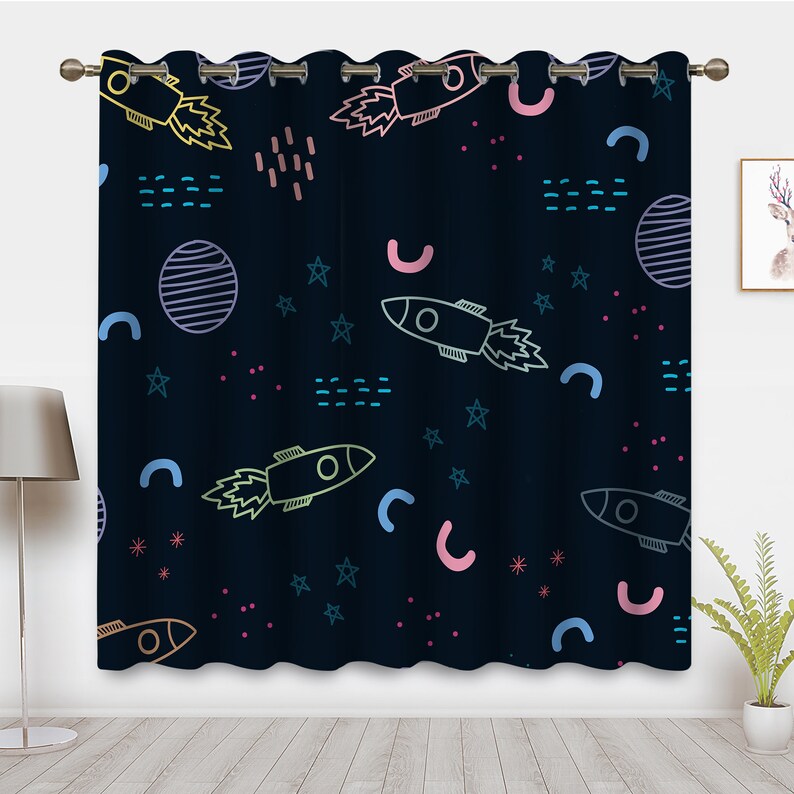 May include: Black curtains with a repeating pattern of rockets, stars, and geometric shapes in pink, blue, yellow, and green.