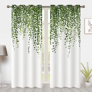 May include: White curtain panels with a green, dotted vine design. The curtains have eyelets for hanging and feature a botanical pattern that cascades down from the top. The design is a mix of light and dark green dots.