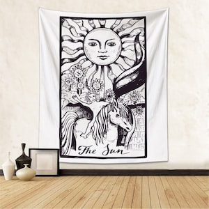 May include: Black and white tapestry featuring a tarot card design with the sun, a unicorn, and the text "The Sun".