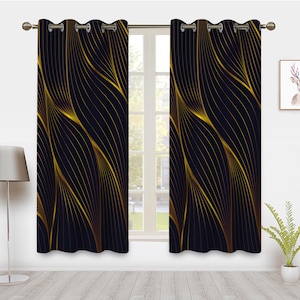May include: A pair of black curtains with a gold abstract pattern. The curtains have grommets for hanging.