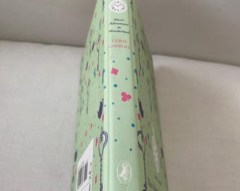 Alice in Wonderland Puffin Classics...Slightly damaged Cover...Distressed Cover... Rare edition