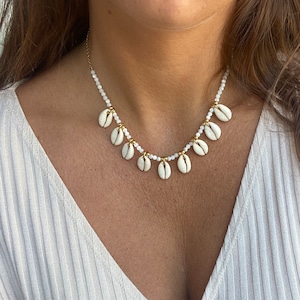 Cowrie shell necklace with mother-of-pearl pearl