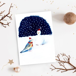 Carte bonoiseau de neige illustration bonhomme de neige oiseau impression mate crayons de couleur