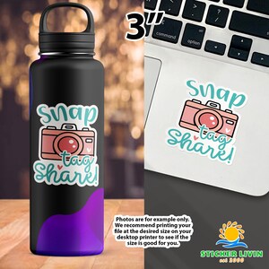 May include: A 3-inch sticker featuring a pink camera illustration with the teal text Snap tag Share! and small hearts. The sticker is shown applied to a black water bottle and a silver laptop surface, demonstrating its size and appearance.