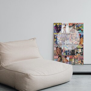 May include: A beige beanbag chair sits next to a framed collage of magazine covers. The collage features various magazine covers with people on them. The words "Made with Love" are visible on the collage.