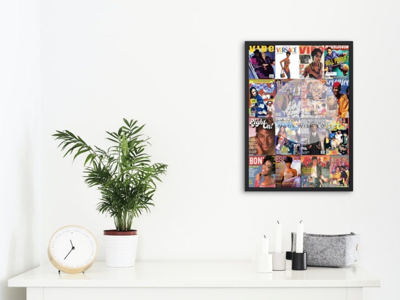 May include: A framed collage of vintage magazine covers, featuring a variety of people and the titles "Vibe", "Right On!", and "Essence". The frame is black, and the collage is displayed on a white wall above a white table.