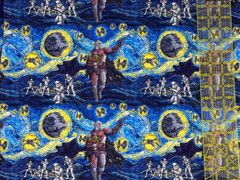 May include: Fabric with a repeating Star Wars design. The artwork shows The Mandalorian with Grogu, Stormtroopers, the Death Star, and TIE fighters against a swirling blue and yellow starry night background.