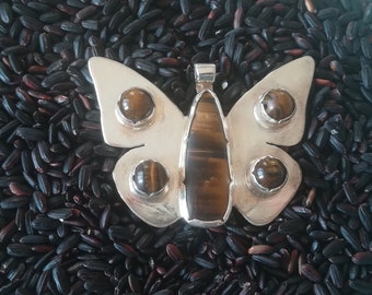 Silver butterfly pendant with Tiger Eye