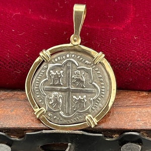 Atocha Shipwreck Treasure Mel fisher silver coin pendant in 14k gold bezel