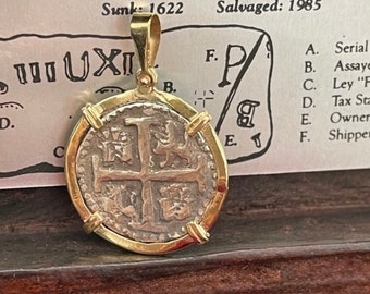 Atocha shipwreck treasure Mel fisher silver coin pendant in 14k gold bezel made from atocha silver