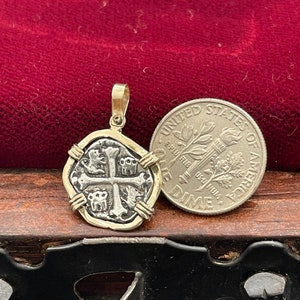 Mini atocha shipwreck treasure Mel Fisher silver coin pendant in 14k gold bezel