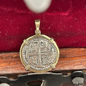 Atocha Shipwreck Treasure Mel fisher silver coin pendant in 14k gold bezel