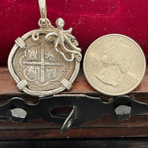 Atocha shipwreck treasure Mel fisher silver coin pendant in octopus bezel