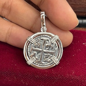 Atocha Shipwreck Treasure Mel fisher silver coin pendant made from atocha silver bars and comes with the certificate