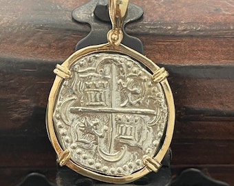 Atocha shipwreck treasure Mel fisher silver coin pendant in 14k solid gold bezel with a polished look