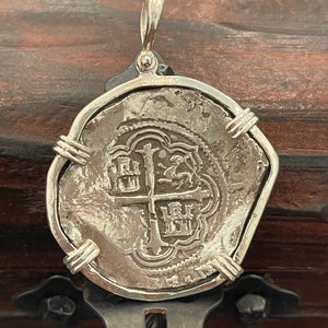 Solid heavy Atocha shipwreck treasure Mel fisher silver coin pendant made from atocha silver bars and it comes with the certificate.