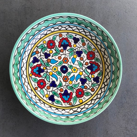 Turquoise fruit bowl with oriental floral details, salad bowl, eating utensils, table decoration, boho