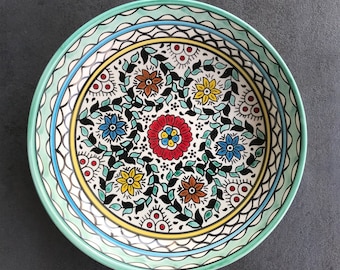 Turquoise fruit bowl with oriental floral details, salad bowl, eating utensils, table decoration, boho
