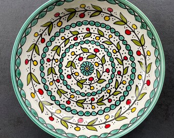 Turquoise fruit bowl with oriental floral details, salad bowl, eating utensils, table decoration, boho