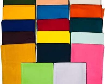 May include: A collection of rectangular fabric swatches arranged in a grid, featuring a diverse palette of solid colours including pink, dark green, navy, peach, blue, red, yellow, orange, teal, light blue, lime green, and white.