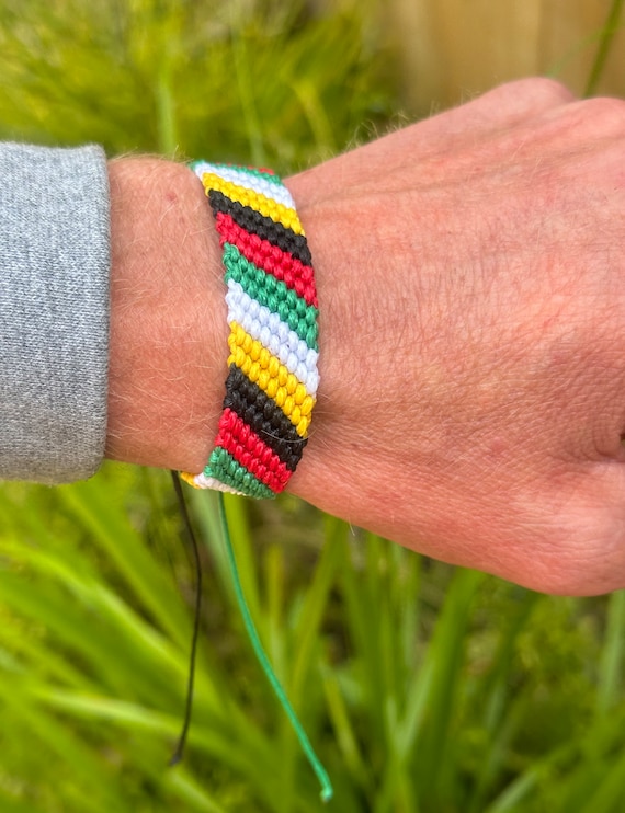 Green white red hotsell black yellow bracelet