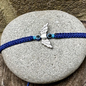 Angel heart wing bracelet-Evil eye bracelet-Navy blue bracelet-Protective-Good luck bracelet-Christmas gift-Handmade-Blue bracelet-BFF-Uk
