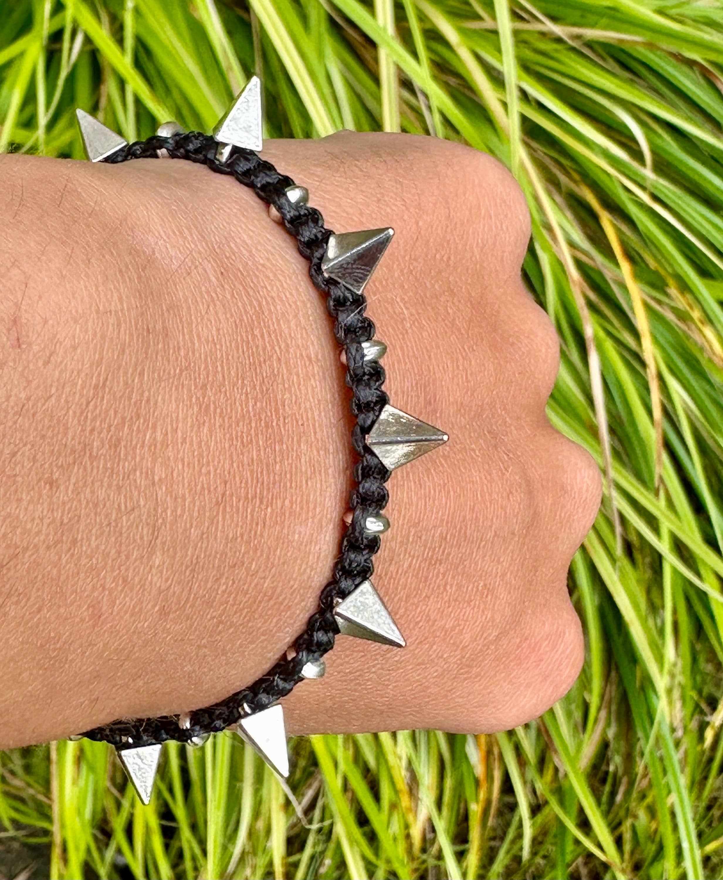 Spiked bracelet meaning deals