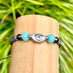 Evil eye bracelet-Blue agate and hematite beads-Woven bracelet-Good fortune bracelet-Braided bracelet-Gemstones bracelet-Grey bracelet-Uk