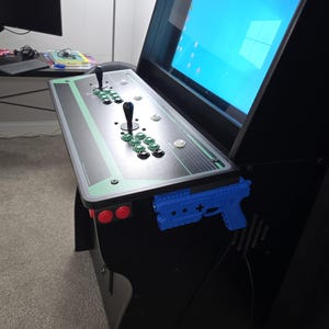 Arcade cabinet mounted pinball controller with launcher button.