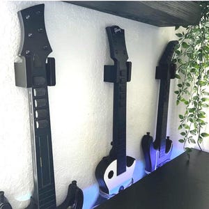Guitar Hero or Rock Band mount with secure tabs