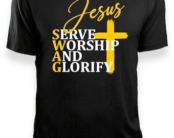 May include: Black t-shirt with the words "Jesus" in a cursive font, a yellow cross, and the words "SERVE WORSHIP AND GLORIFY" in a bold font. The shirt is a crew neck style.