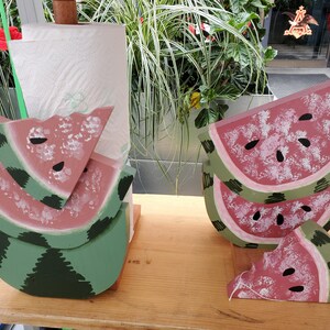 Conjunto de guardanapo e prato de melancia com porta-toalha de papel