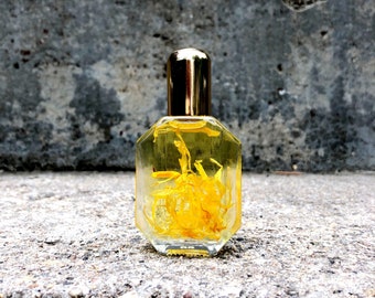 Vive en el perfume de aceite esencial natural Sunshine Luxe con cítricos y vainilla