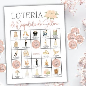 May include: A Loter&iacute;a de Despedida de Soltera game card featuring a grid of wedding-themed illustrations and text, including icons for a cake, rings, and bride. Several circular markers with the text S&iacute; Acepto are placed on the grid.