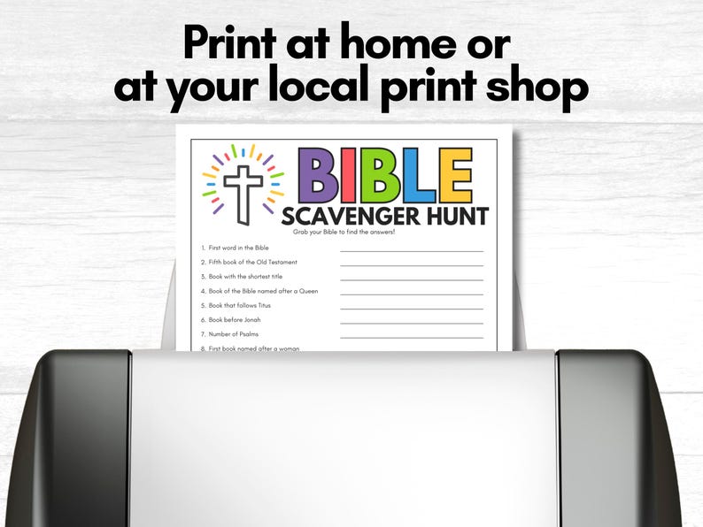 May include: A printed Bible Scavenger Hunt sheet with a cross and colorful text is in a printer. The text reads "Print at home or at your local print shop" and "BIBLE SCAVENGER HUNT".