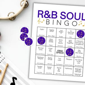 May include: R&B Soul Bingo game with song titles and artist names. Includes purple stickers with musical notes, a red headset, a tambourine, and musical notes on a staff.