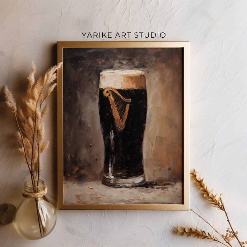 May include: A painting of a glass of Guinness beer with a white head and the Guinness harp logo on the side. The painting is done in a dark brown and gold colour palette.