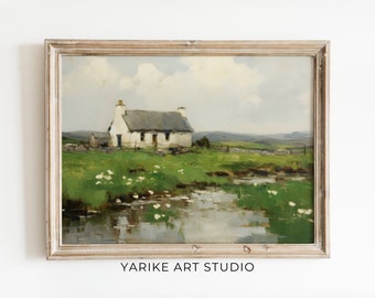 May include: A framed painting depicting a white cottage with a thatched roof, situated amidst rolling green hills and a serene stream. The sky is a soft blue with fluffy white clouds.