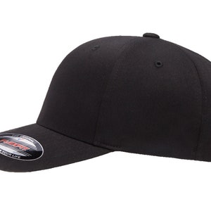 May include: A black fitted baseball cap with a curved brim and a black and white logo that says "Flexfit The Original Fit Your Life".