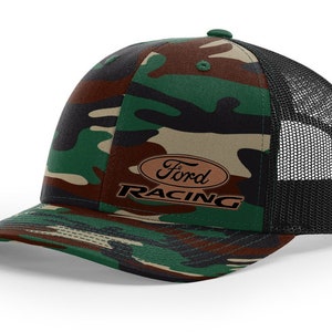 May include: A camouflage trucker hat with a brown leather patch that says "Ford Racing" in black lettering.