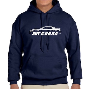 May include: A navy blue hooded sweatshirt with a white outline of a Ford Mustang SVT Cobra and the text "SVT Cobra" printed on the front.