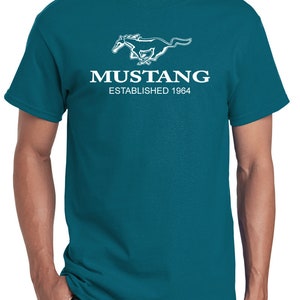 May include: A teal blue t-shirt with a white Ford Mustang logo and the text "Mustang Established 1964".
